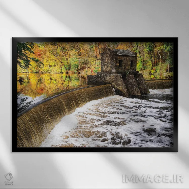 تابلو دکوراتیو سد و آبشار روی دریاچه اسپیدول در پاییز، نیوجرسی اثر جورج اوزه - نمای قابدار مشکی