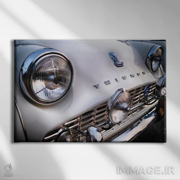 تابلو دکوراتیو نمای نزدیک از جلو خودروی اسپرت بریتانیایی کلاسیک ترایومف TR3… اثر جورج اوزه - نمای روبهرو روی دیوار