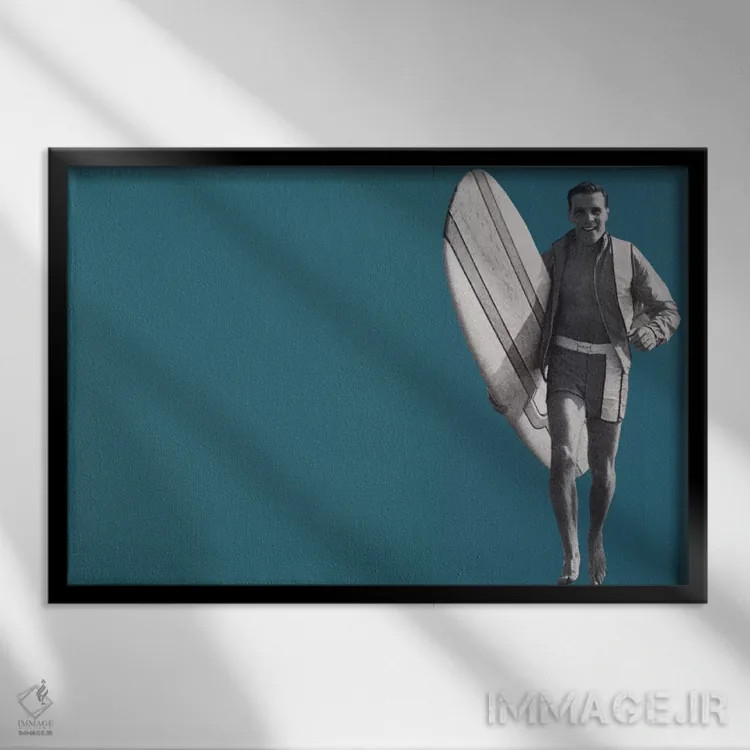 تابلو دکوراتیو پسر موج سوار اثر همینگوی دیزاین - نمای قابدار مشکی