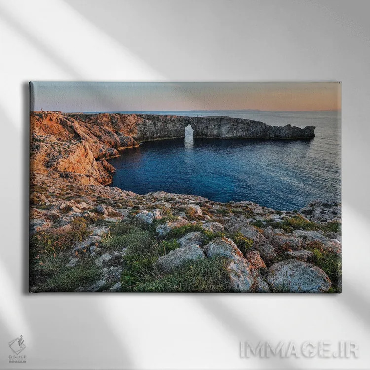 تابلو دکوراتیو Menorca, Spain,غروب در پونت دن ژیل ، منورکا، اسپانیا اثر هولیس لونی - نمای روبهرو روی دیوار