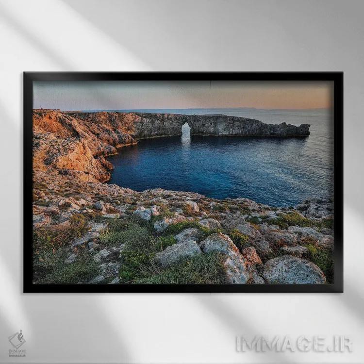 تابلو دکوراتیو Menorca, Spain,غروب در پونت دن ژیل ، منورکا، اسپانیا اثر هولیس لونی - نمای قابدار مشکی