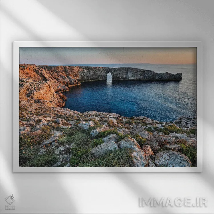 تابلو دکوراتیو Menorca, Spain,غروب در پونت دن ژیل ، منورکا، اسپانیا اثر هولیس لونی - نمای قابدار سفید