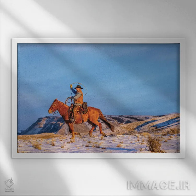 تابلو دکوراتیو Wyoming Hideout Horse Ranch, Wrangler And Horse In Snow,آمری… اثر هولیس لونی - نمای قابدار سفید