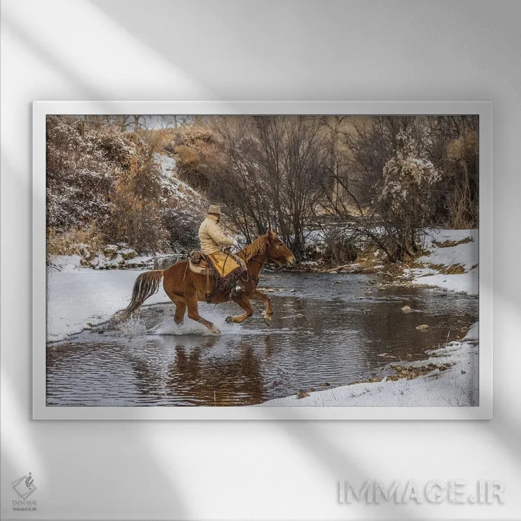 تابلو دکوراتیو Wyoming Hideout Horse Ranch, Wrangler Crossing The Stream On… اثر هولیس لونی - نمای قابدار سفید