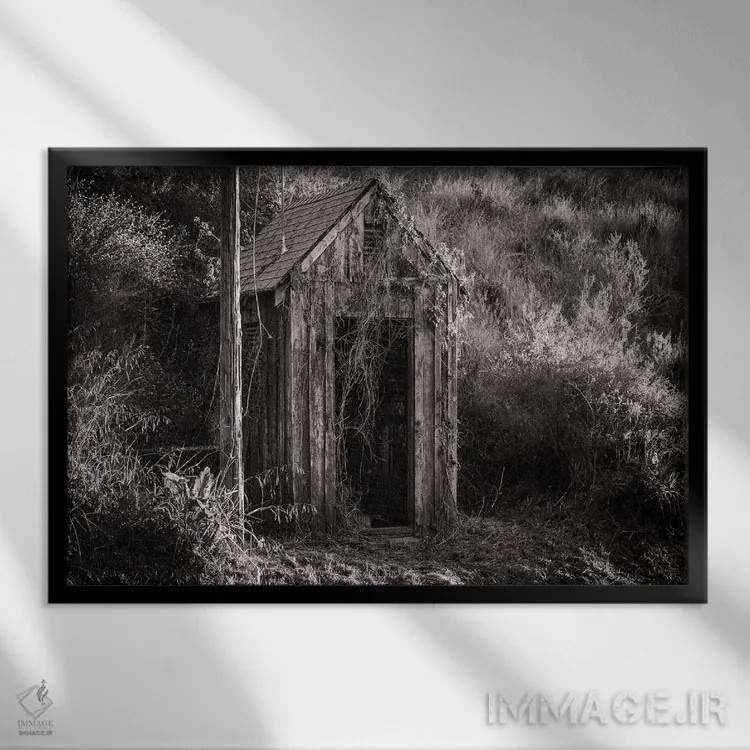 تابلو دکوراتیو کلبه قدیمی سیاه و سفید اثر هدر رابرسون - نمای قابدار مشکی