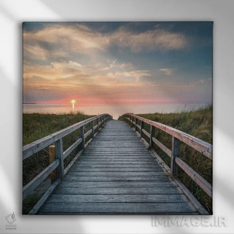 تابلو دکوراتیو قدم زدن در ساحل تپه شنی هنگام غروب خورشید اثر یان بکه - نمای روبهرو روی دیوار