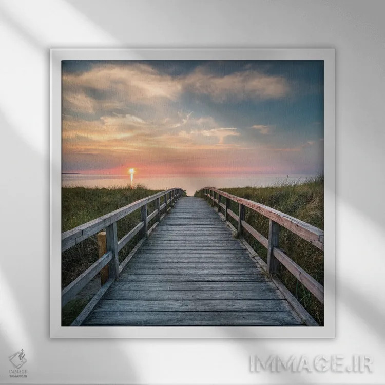 تابلو دکوراتیو قدم زدن در ساحل تپه شنی هنگام غروب خورشید اثر یان بکه - نمای قابدار سفید