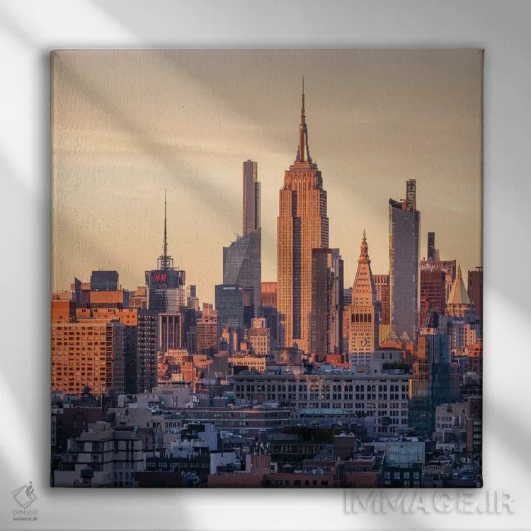 تابلو دکوراتیو New York City, USA,ساختمان امپایر استیت در غروب آفتاب، نیویورک… اثر یان بکه - نمای روبهرو روی دیوار