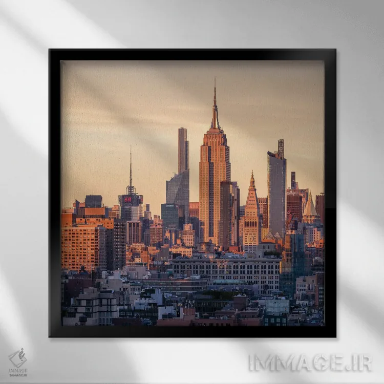 تابلو دکوراتیو New York City, USA,ساختمان امپایر استیت در غروب آفتاب، نیویورک… اثر یان بکه - نمای قابدار مشکی