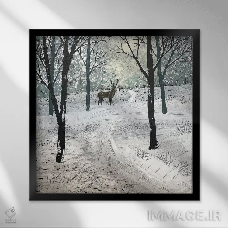 تابلو دکوراتیو گوزن در برف اثر جو گراندی - نمای قابدار مشکی