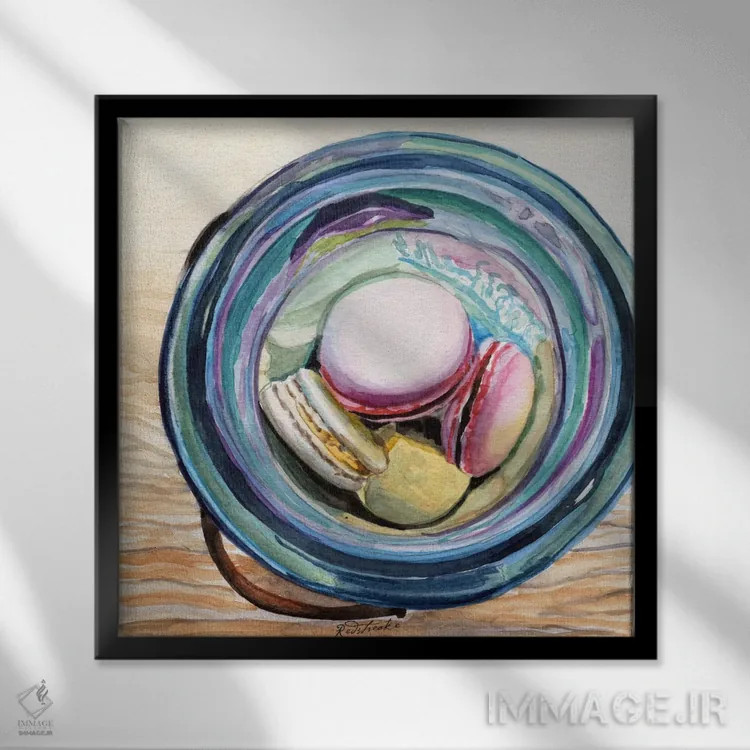 تابلو دکوراتیو شیشه ی Ball پر از ماکارون اثر جنیفر رداستریک - نمای قابدار مشکی