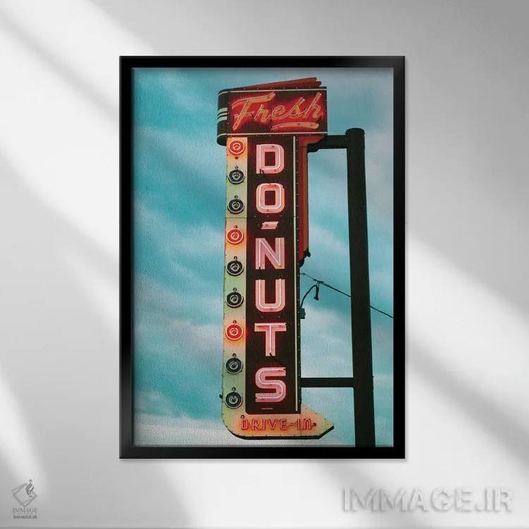 تابلو دکوراتیو دونات تازه اثر دانیتا دلیمنت - نمای قابدار مشکی