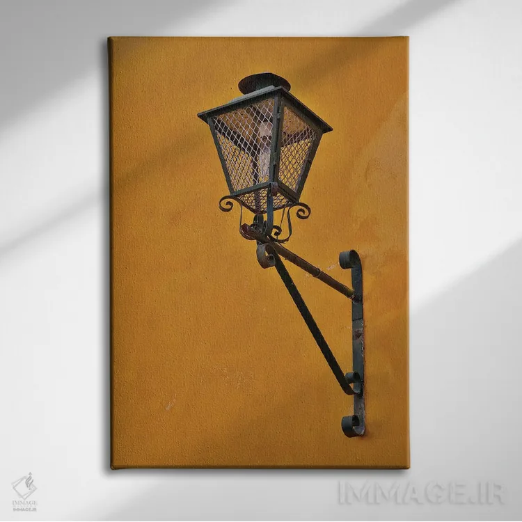 تابلو دکوراتیو Mexico. Lantern and shadow on colorful buildings,سن میگوئل د… اثر دارل گالین - نمای روبهرو روی دیوار