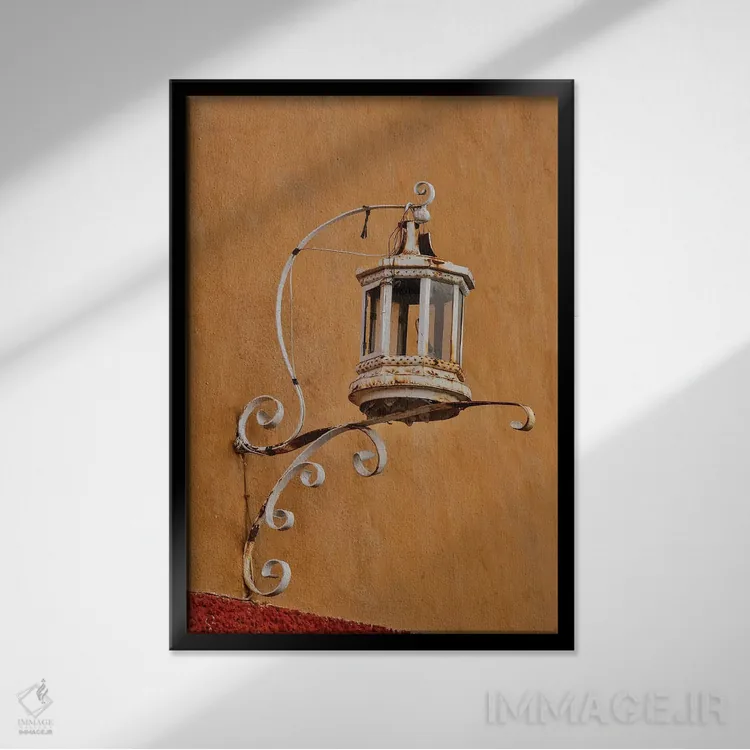 تابلو دکوراتیو Mexico. Lantern and shadow on colorful buildings,سن میگوئل د… اثر دارل گالین - نمای قابدار مشکی