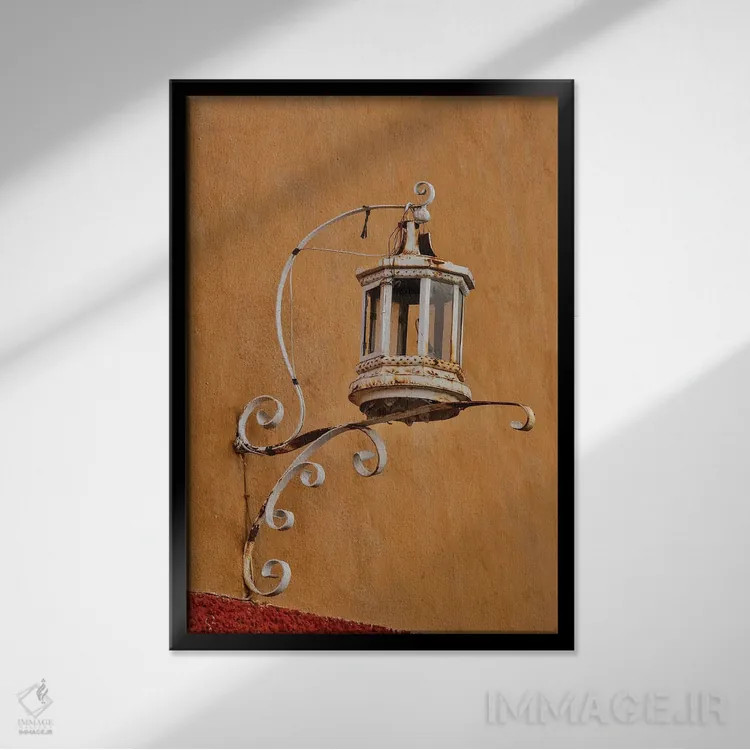 تابلو دکوراتیو Mexico. Lantern and shadow on colorful buildings,سن میگوئل د… اثر دارل گالین - نمای قابدار مشکی