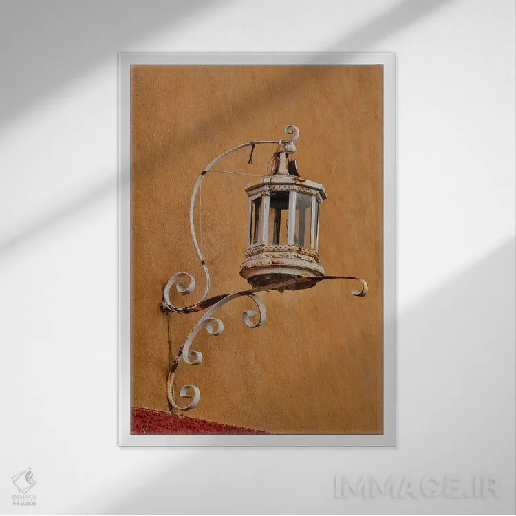تابلو دکوراتیو Mexico. Lantern and shadow on colorful buildings,سن میگوئل د… اثر دارل گالین - نمای قابدار سفید