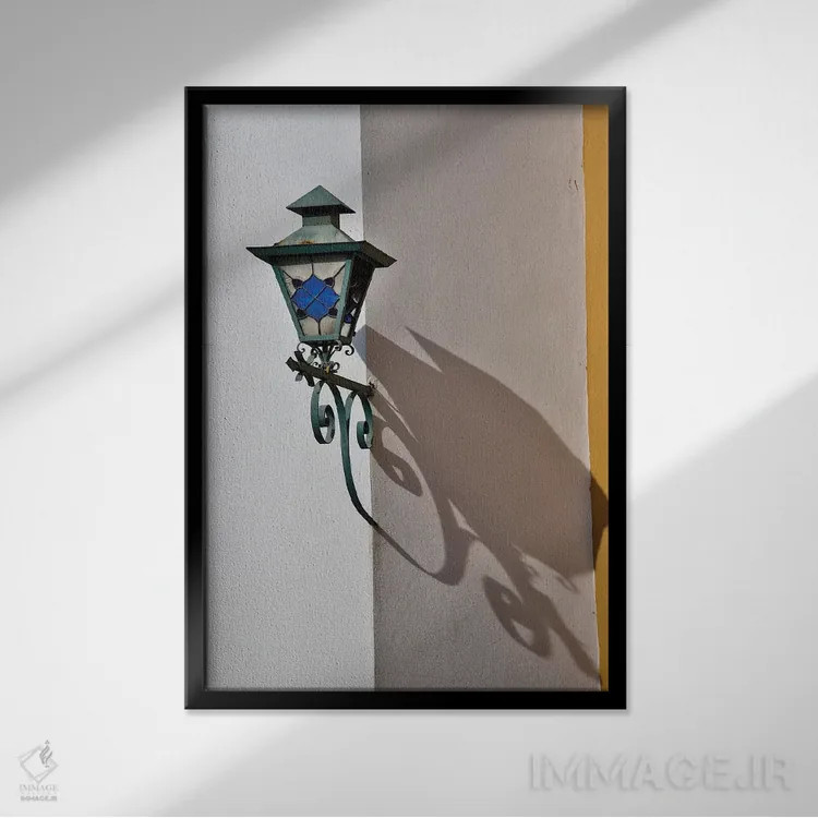 تابلو دکوراتیو Mexico. Lantern and shadow on colorful buildings,سن میگوئل د… اثر دارل گالین - نمای قابدار مشکی