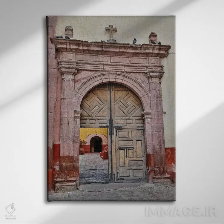 تابلو دکوراتیو Mexico. Open doorway into plaza of church,سن میگوئل د آلنده… اثر دارل گالین - نمای روبهرو روی دیوار