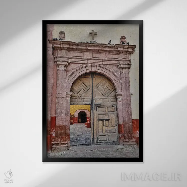 تابلو دکوراتیو Mexico. Open doorway into plaza of church,سن میگوئل د آلنده… اثر دارل گالین - نمای قابدار مشکی