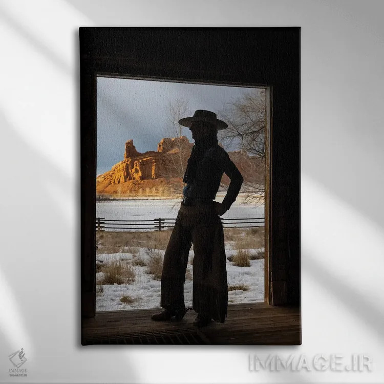 تابلو دکوراتیو Shell, Wyoming Hideout Ranch With Cowgirl Silhouetted In Doo… اثر دارل گالین - نمای روبهرو روی دیوار