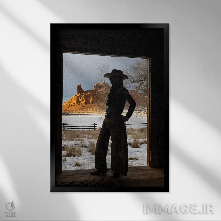 تابلو دکوراتیو Shell, Wyoming Hideout Ranch With Cowgirl Silhouetted In Doo… اثر دارل گالین - نمای قابدار مشکی