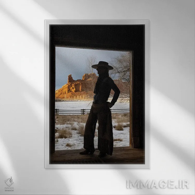 تابلو دکوراتیو Shell, Wyoming Hideout Ranch With Cowgirl Silhouetted In Doo… اثر دارل گالین - نمای قابدار سفید