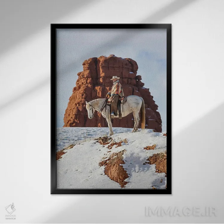 تابلو دکوراتیو Wyoming Hideout Ranch Cowgirl On Horseback Riding On Ridgeli… اثر دارل گالین - نمای قابدار مشکی