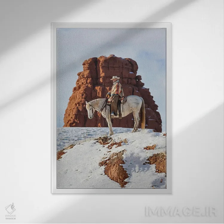 تابلو دکوراتیو Wyoming Hideout Ranch Cowgirl On Horseback Riding On Ridgeli… اثر دارل گالین - نمای قابدار سفید