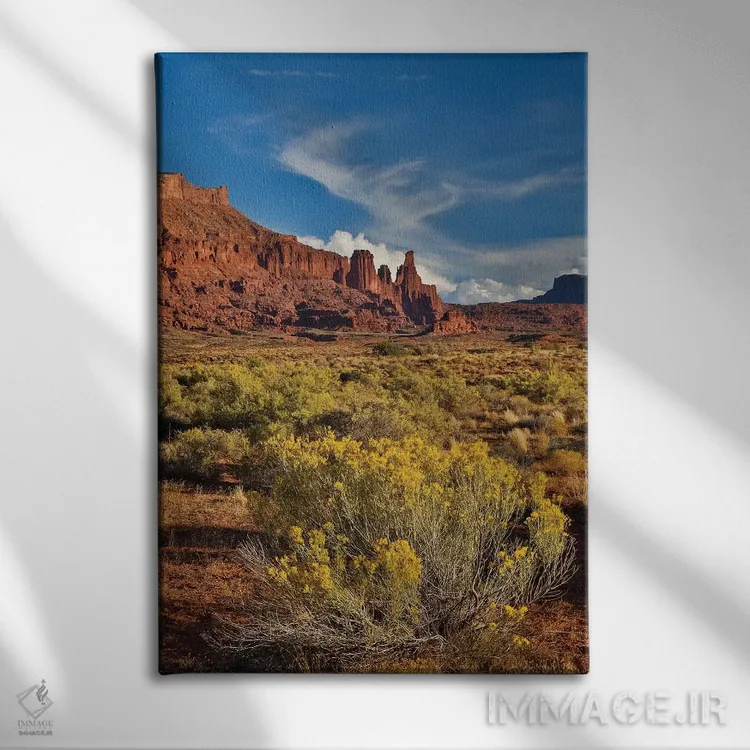 تابلو دکوراتیو Utah in evening light,برج های فیشر، یوتا در نور غروب اثر دارل گالین - نمای روبهرو روی دیوار