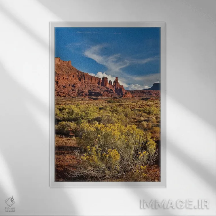 تابلو دکوراتیو Utah in evening light,برج های فیشر، یوتا در نور غروب اثر دارل گالین - نمای قابدار سفید