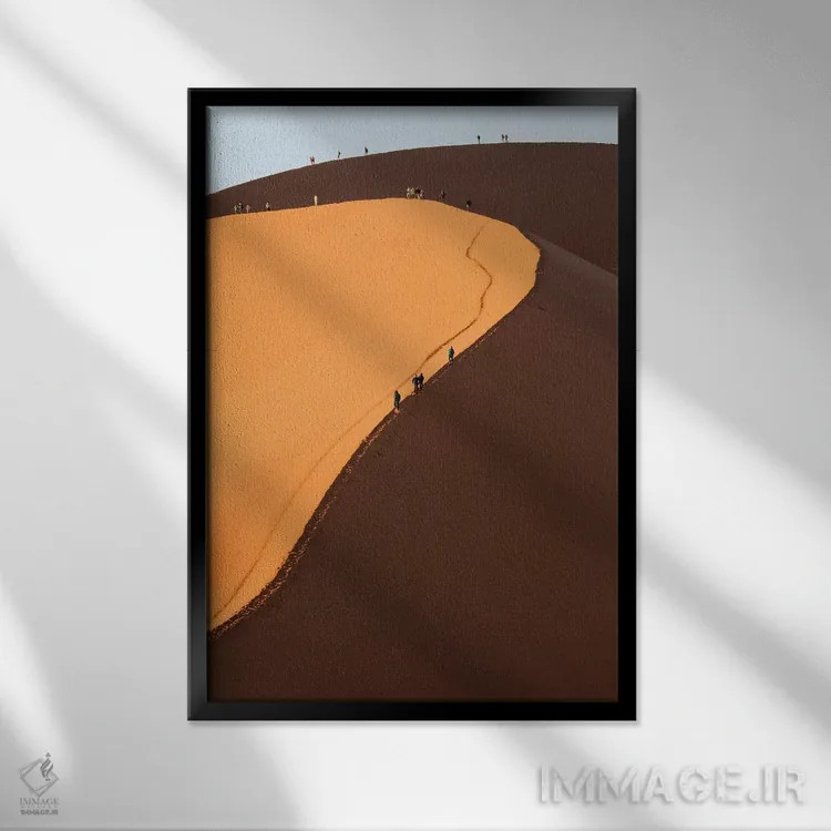 تابلو دکوراتیو Namib Desert. Hikers climbing the red sand dune in Namibi… اثر دبورا وینچستر - نمای قابدار مشکی