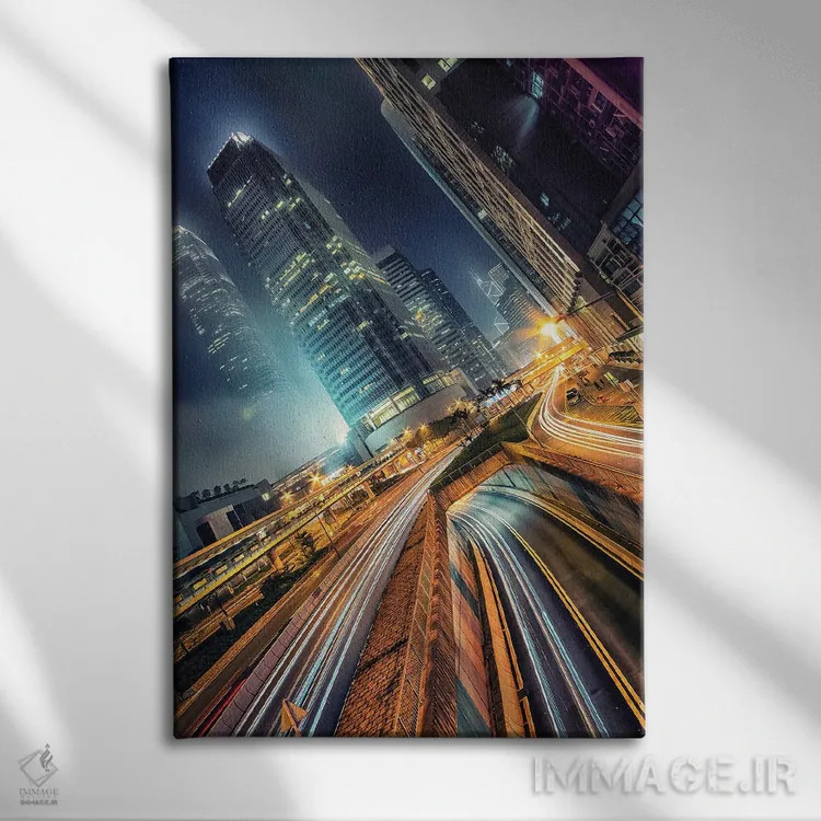 تابلو دکوراتیو هنگ کنگ در شب اثر مانجیک پیکچرز - نمای روبهرو روی دیوار