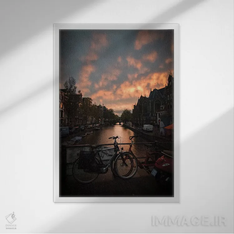 تابلو دکوراتیو غروب در آمستردام اثر انزو رومانو - نمای قابدار سفید