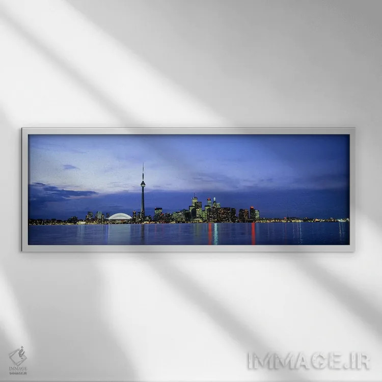 تابلو دکوراتیو Toronto, Ontario, Canada,خط افق مرکز شهر در شامگاه، تور… اثر پانورامیک ایمجز - نمای قابدار سفید