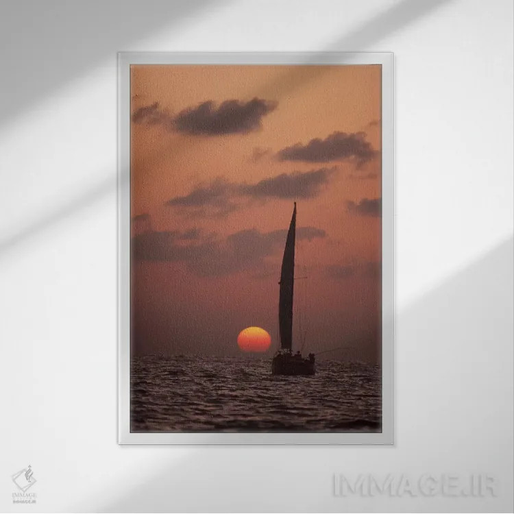 تابلو دکوراتیو قایق بادبانی سرگردان در غروب، سریلانکا اثر فلیپ نیکلین - نمای قابدار سفید