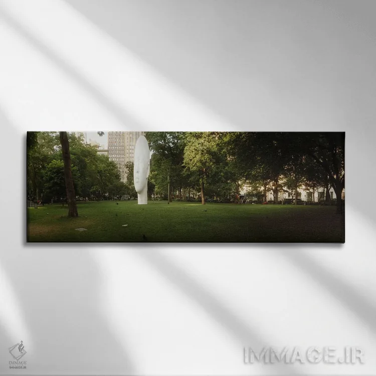 تابلو دکوراتیو مجسمه سر بزرگ در یک پارک، پارک مادیسون اسکوئر، میدان ما… اثر پانورامیک ایمجز - نمای روبهرو روی دیوار