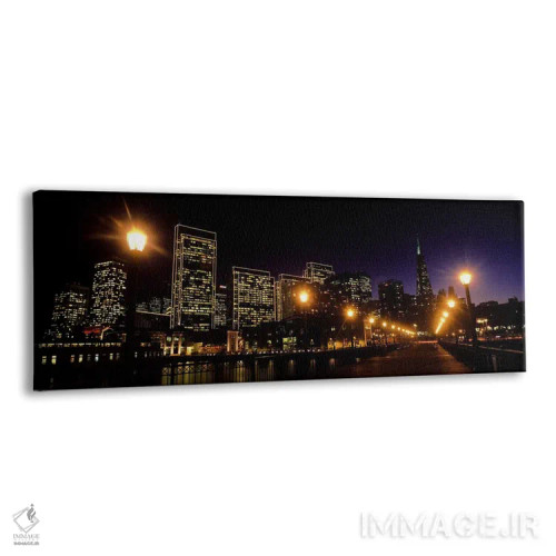 تابلو دکوراتیو ساختمان ها در کنار آب روشن شده در شب، سانفرانسیسکو، کال… اثر پانورامیک ایمجز - نمای پرسپکتیو محصول