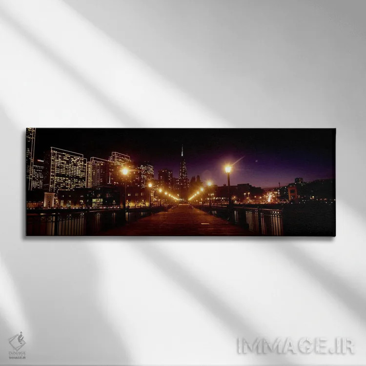 تابلو دکوراتیو ساختمان ها در کنار آب روشن شده در شب، سانفرانسیسکو، کال… اثر پانورامیک ایمجز - نمای روبهرو روی دیوار