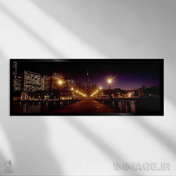 تابلو دکوراتیو ساختمان ها در کنار آب روشن شده در شب، سانفرانسیسکو، کال… اثر پانورامیک ایمجز - نمای قابدار مشکی