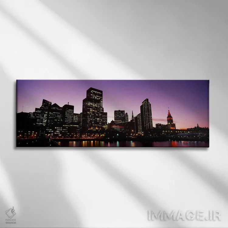 تابلو دکوراتیو ساختمان ها در کنار آب روشن شده در غروب، سانفرانسیسکو، ک… اثر پانورامیک ایمجز - نمای روبهرو روی دیوار