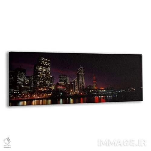 تابلو دکوراتیو ساختمان ها در کنار آب روشن شده در شب، سانفرانسیسکو، کال… اثر پانورامیک ایمجز - نمای پرسپکتیو محصول