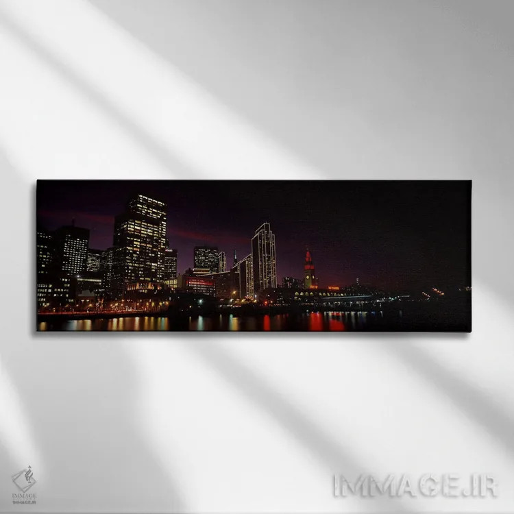 تابلو دکوراتیو ساختمان ها در کنار آب روشن شده در شب، سانفرانسیسکو، کال… اثر پانورامیک ایمجز - نمای روبهرو روی دیوار