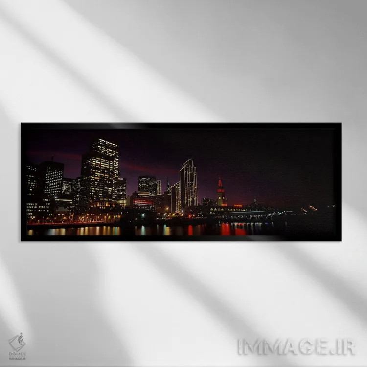 تابلو دکوراتیو ساختمان ها در کنار آب روشن شده در شب، سانفرانسیسکو، کال… اثر پانورامیک ایمجز - نمای قابدار مشکی