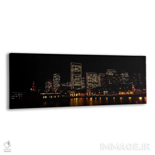 تابلو دکوراتیو ساختمان ها در کنار آب روشن شده در شب، سانفرانسیسکو، کال… اثر پانورامیک ایمجز - نمای پرسپکتیو محصول