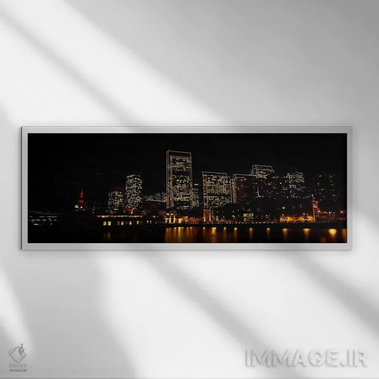 تابلو دکوراتیو ساختمان ها در کنار آب روشن شده در شب، سانفرانسیسکو، کال… اثر پانورامیک ایمجز - نمای قابدار سفید