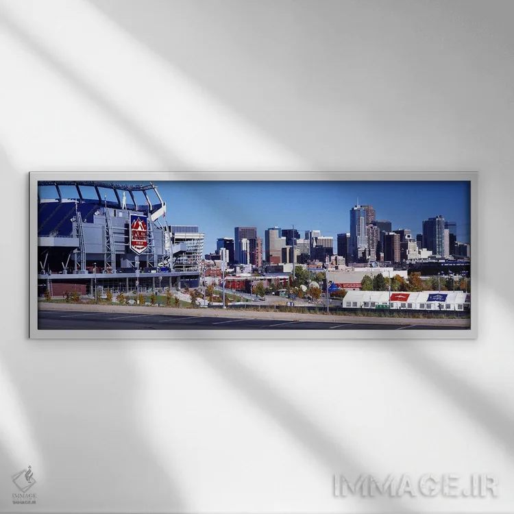 تابلو دکوراتیو استادیوم در یک شهر، میدان ورزشی اسپورتس اتوریتی در ارتف… اثر پانورامیک ایمجز - نمای قابدار سفید