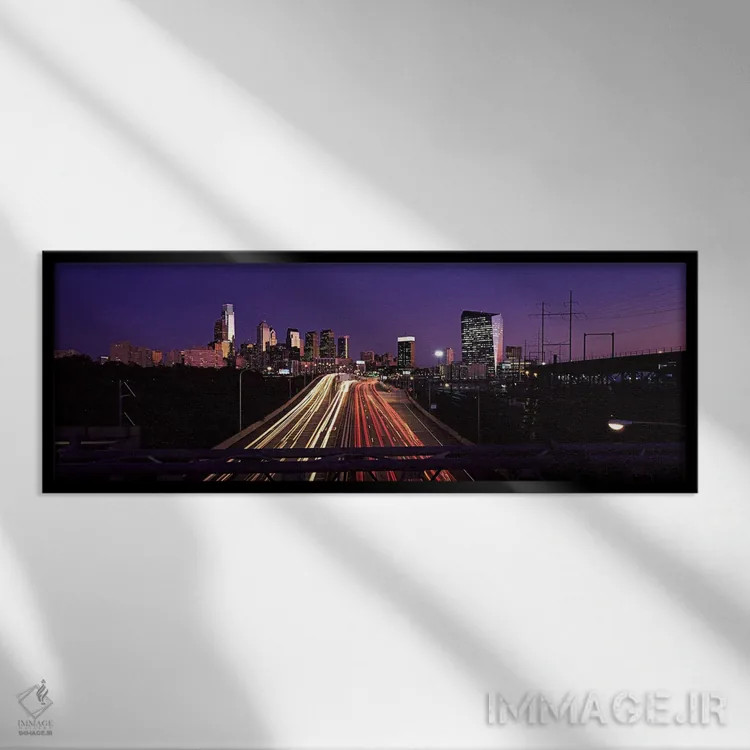 تابلو دکوراتیو رگه های نور وسایل نقلیه در بزرگراه در غروب، فیلادلفیا… اثر پانورامیک ایمجز - نمای قابدار مشکی