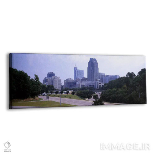 تابلو دکوراتیو صحنه خیابانی با ساختمان ها در یک شهر، رالی، شهرستان ویک… اثر پانورامیک ایمجز - نمای پرسپکتیو محصول