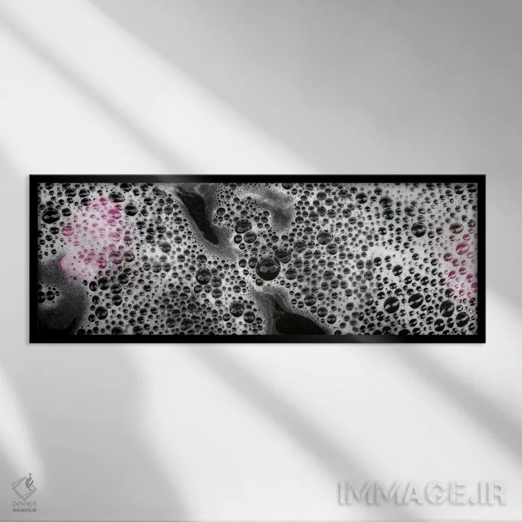 تابلو دکوراتیو حباب ها و گلبرگ های گل صورتی اثر پانورامیک ایمجز - نمای قابدار مشکی