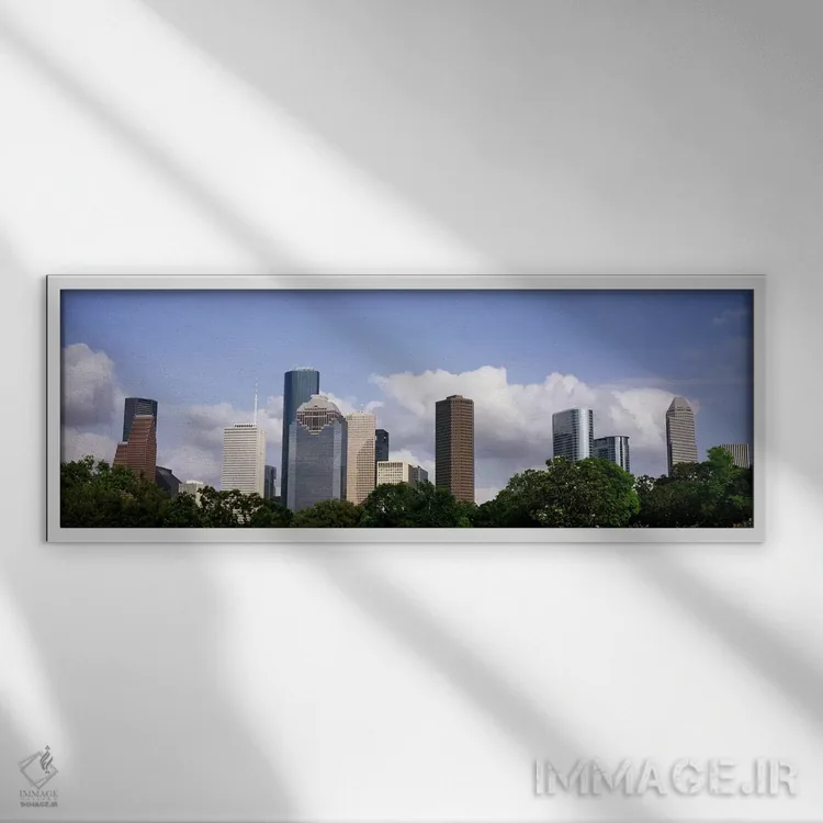 تابلو دکوراتیو نمای پایین از ساختمان ها در یک شهر، برج وج، ساختمان اکس… اثر پانورامیک ایمجز - نمای قابدار سفید